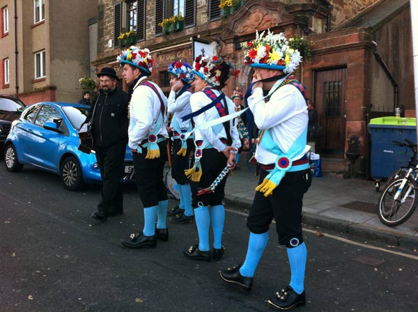 Morris men relaxing between dances