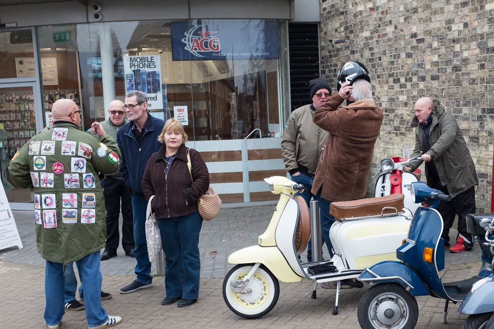 vespa scooters - and riders talking
