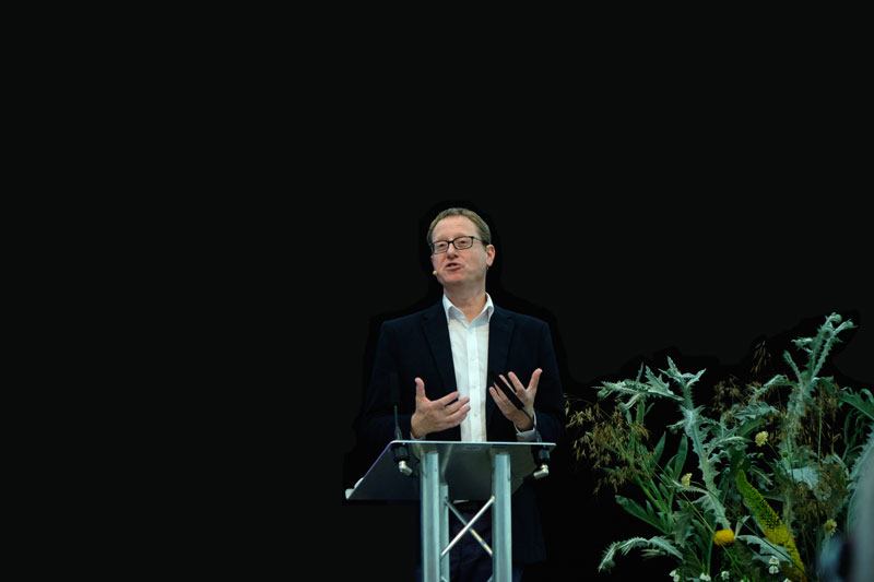Jonathan Saul Freedland, British journalist, who writes a weekly column for The Guardian. He presents BBC Radio 4's contemporary history series, The Long View. Freedland also writes best-selling thrillers, mainly under the pseudonym Sam Bourne - photographed here on the podium at the Wimpole Hall History Festival