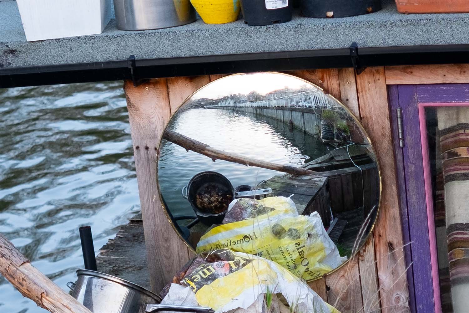 crop of boat or barge moored on the river Cam at Cambridge