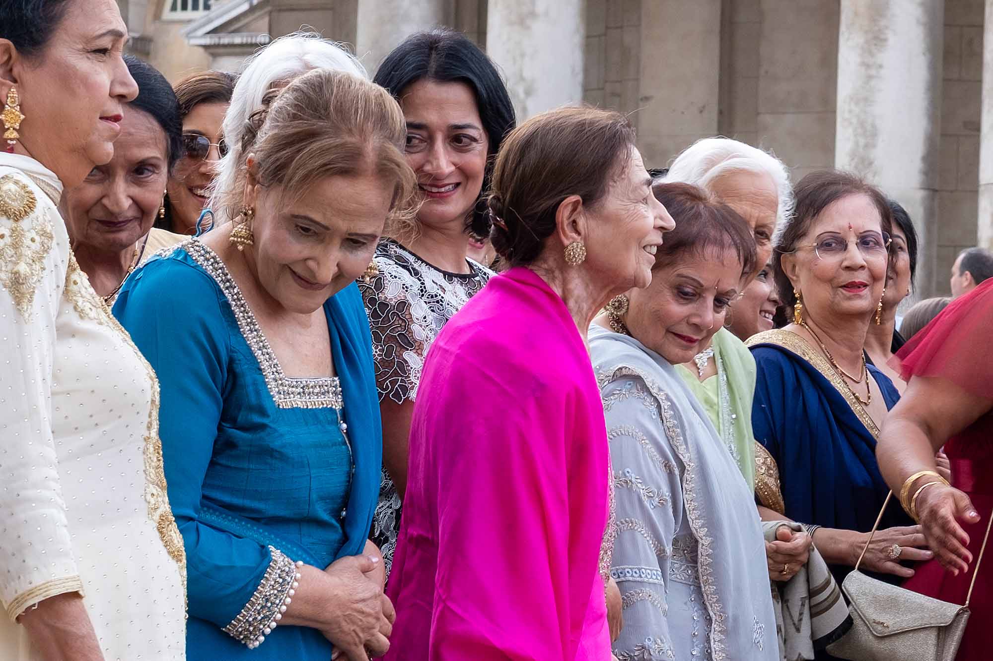 People in a wedding party when out with fellow photographers