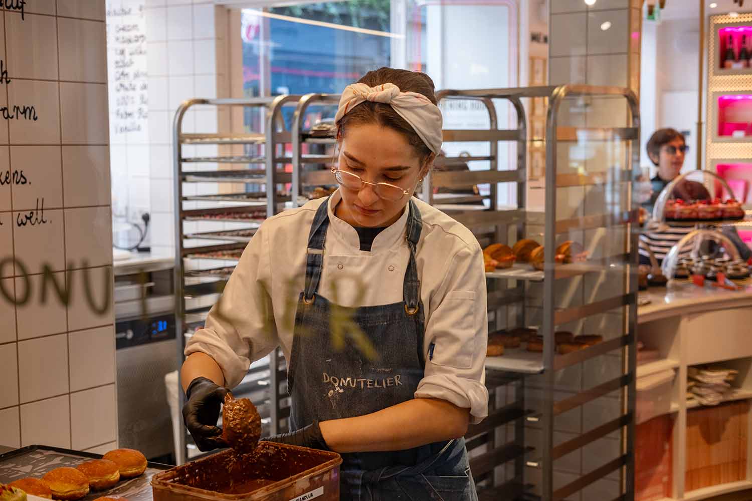 Donutelia craftsperson making Rochers Gianduja